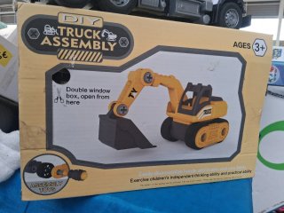 Escabadora de juguete para ensamblar