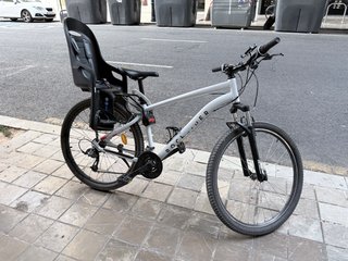 Bicicleta Rockrider con silla para bebé
