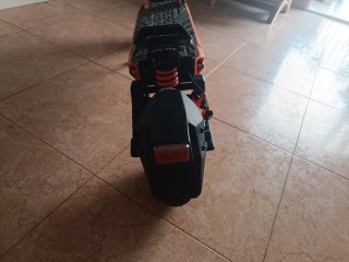 Patinete Eléctrico Naranja y Negro