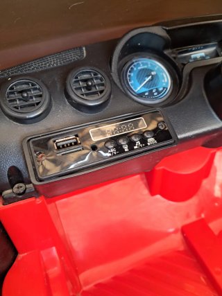 Coche eléctrico infantil rojo