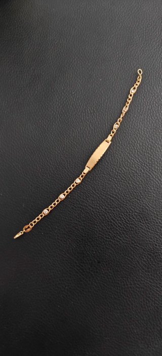Pulsera de oro 18k con circonitas.