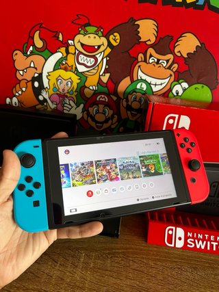 Nintendo Switch Azul y Rojo COMO NUEVA + accesorio