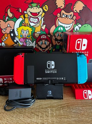 Nintendo Switch Azul y Rojo COMO NUEVA + accesorio
