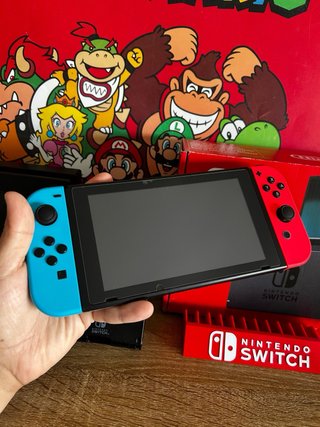 Nintendo Switch Azul y Rojo COMO NUEVA + accesorio