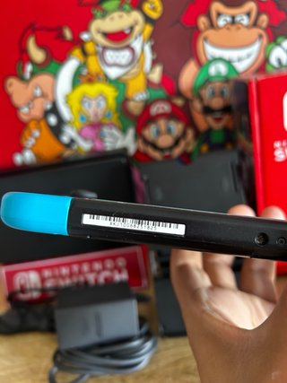 Nintendo Switch Azul y Rojo COMO NUEVA + accesorio