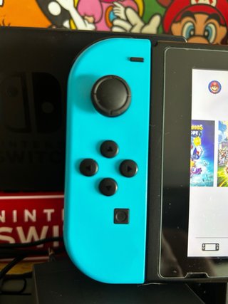 Nintendo Switch Azul y Rojo COMO NUEVA + accesorio