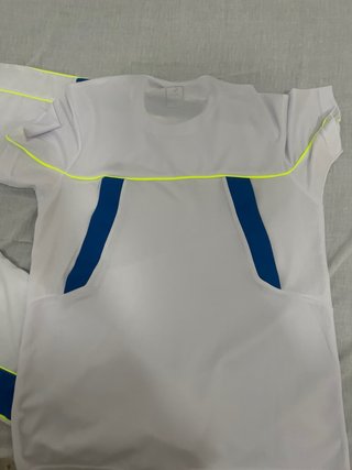 Conjunto deportivo Lacoste blanco y azul