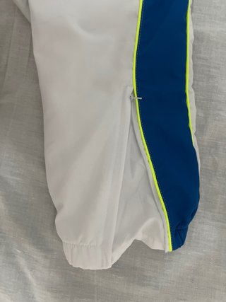 Conjunto deportivo Lacoste blanco y azul