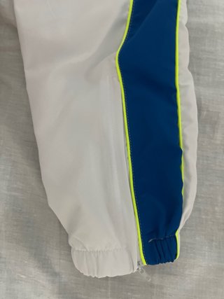 Conjunto deportivo Lacoste blanco y azul
