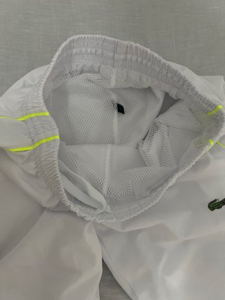 Conjunto deportivo Lacoste blanco y azul