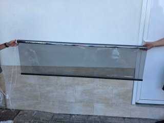 Tende trasparenti per vetrine con filtro solare