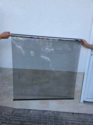 Tende trasparenti per vetrine con filtro solare