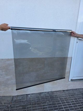 Tende trasparenti per vetrine con filtro solare