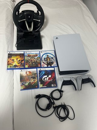 Playstation 5 + Volante + 5 Giochi