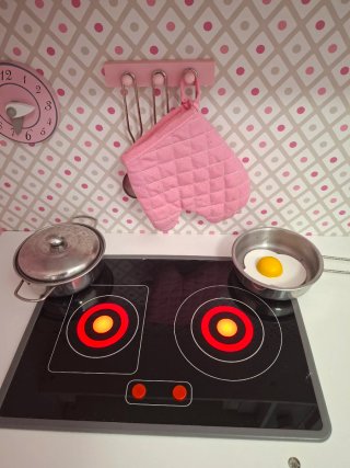 Cocinita de juguete rosa