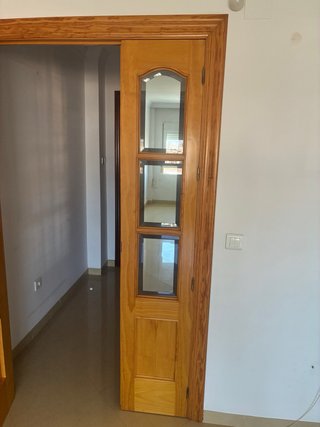 Puerta doble madera con cristales efecto espejo