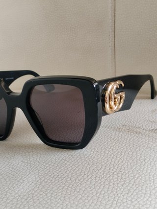 Gafas de sol Gucci mujer negras y doradas