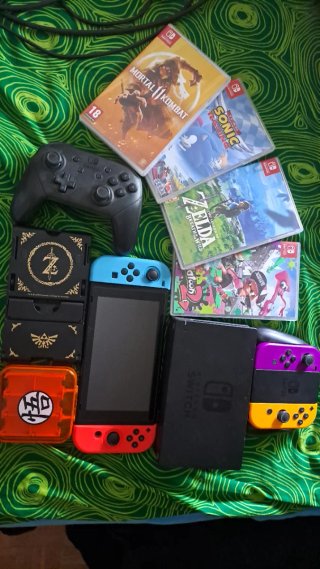 Nintendo Switch con mandos y juegos
