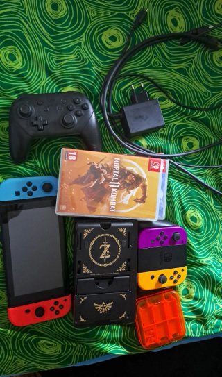 Nintendo Switch con mandos y juegos