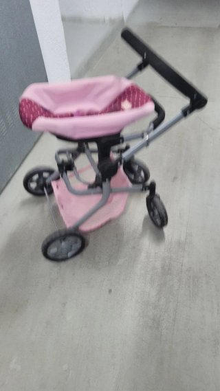 Carro de muñecas rosa con cesta