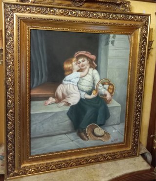 Quadro con cornice dorata