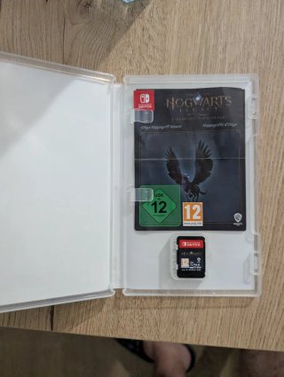 Nintendo Switch V2 + 4 Joycons + Funda + Hogwarts