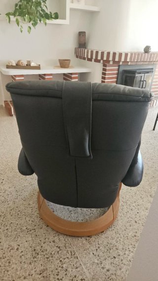 Sofá y butaca de piel negro