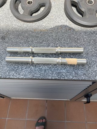 Rack plegable + banc + barra + discos .