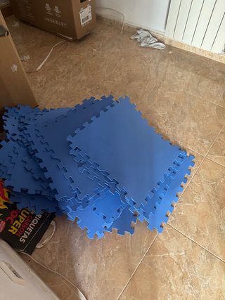 Protector de suelo puzzle azul