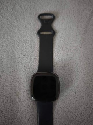 Fitbit Sense / Versa (Piezas/Reparar) + Cargador