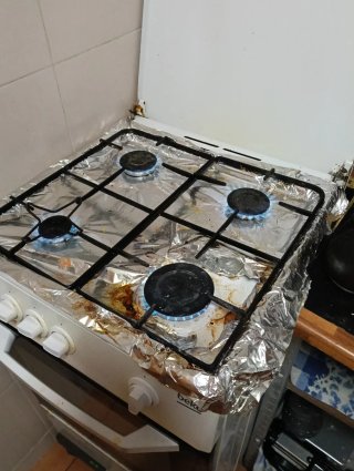 Cocina 4 fuegos gas butano y horno