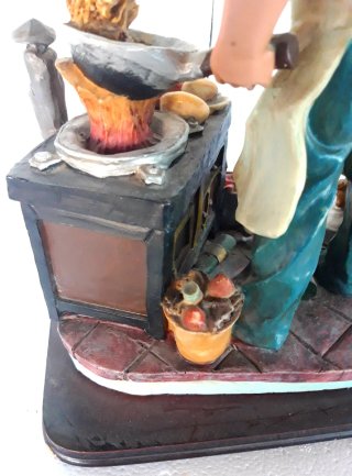 Statua cuoco con cucina e accessori