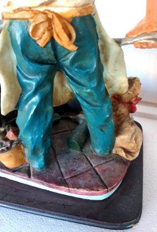 Statua cuoco con cucina e accessori