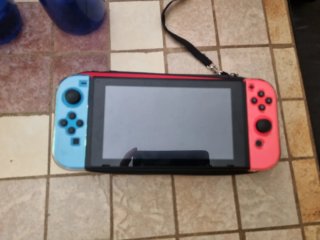 Nintendo Switch Azul y Rosa en los mandos