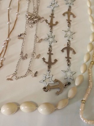 Set collane e catene con ancore e stelle
