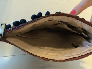 Bolso de mano étnico con monedas