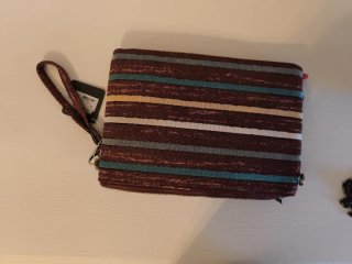Bolso de mano étnico con monedas
