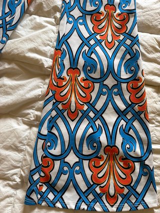 Pantaloni a zampa elasticizzati fantasia
