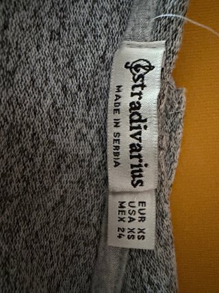 Jersey gris con mensaje DREAM BIG