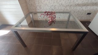 Tavolo da centro in acciaio e cristallo