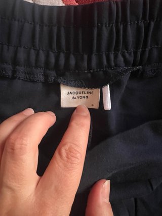 Pantalón corto azul con cinturón