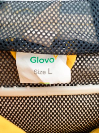 Chubasquero y pantalón Glovo