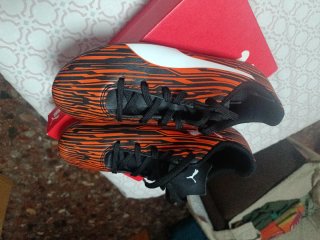 Botas de fútbol Puma Naranja y Negro