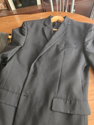 Traje de chaqueta gris a cuadros