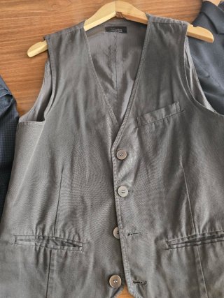 Traje de chaqueta gris a cuadros