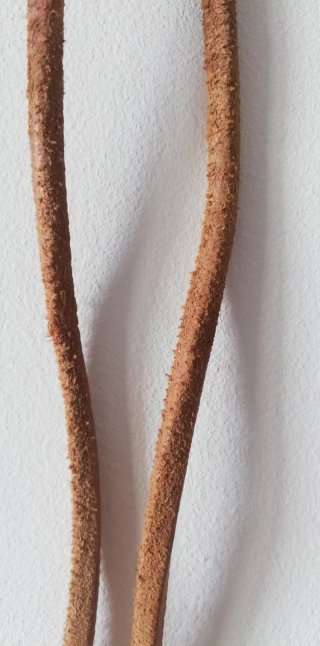 Comba de piel con mangos de madera