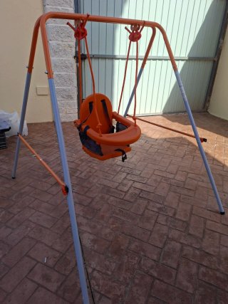 Columpio para niños naranja sin usar
