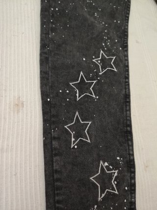 Pantalones Amiri grises con estrellas