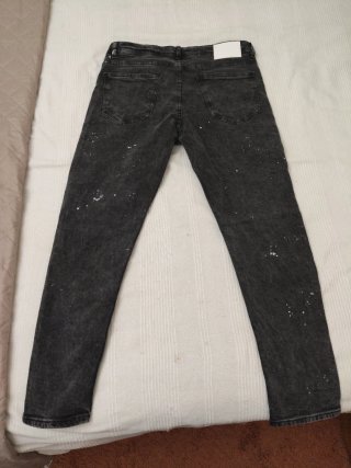 Pantalones Amiri grises con estrellas