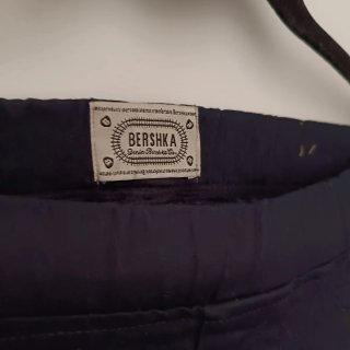 Pantalón negro elástico acampanado
